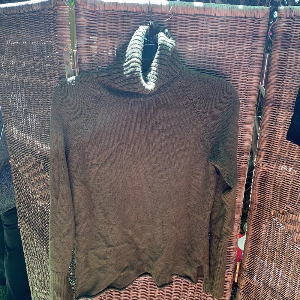 Green turtleneck sweater